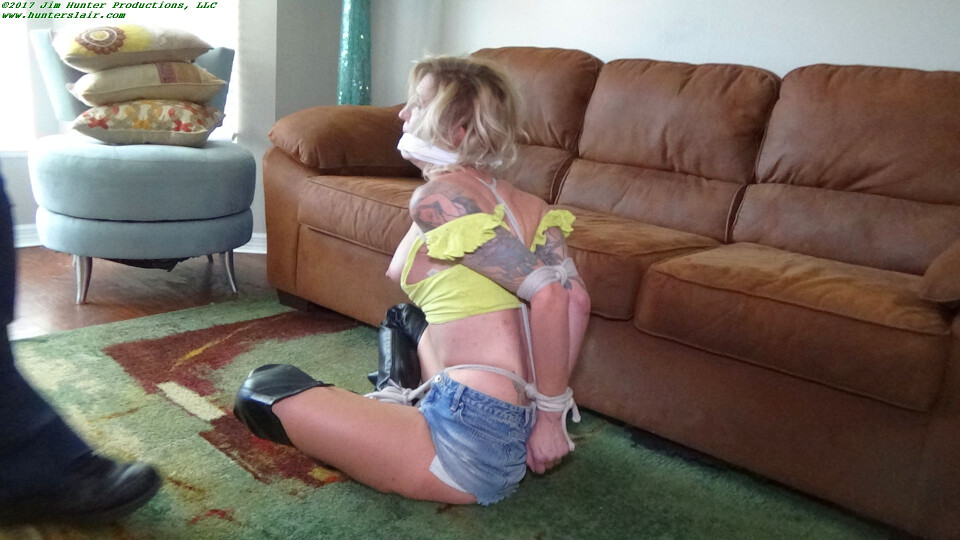 Haughty blond bimbo left helplessly chicken winged, crotch roped and ball tied on the floor